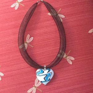 Gorgeous stretch mesh necklace with glass heart.